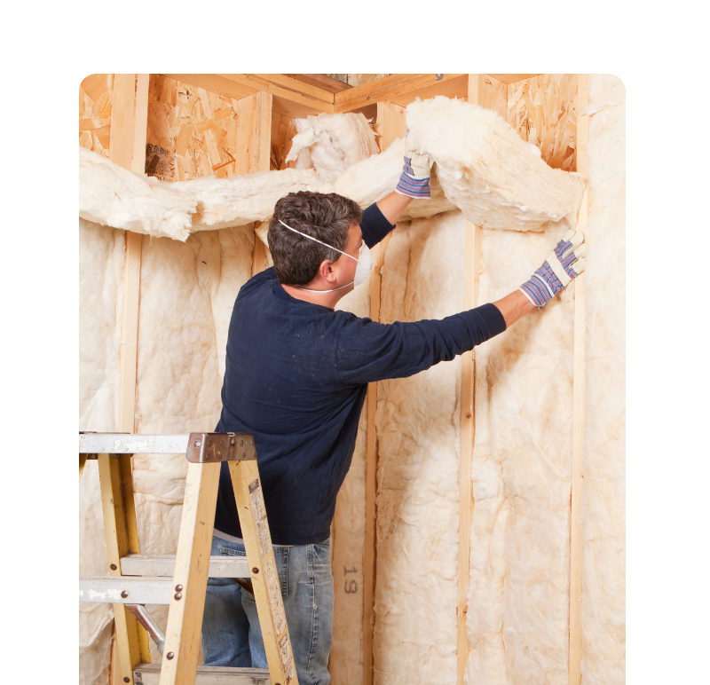 Man Installing Wall Insulation