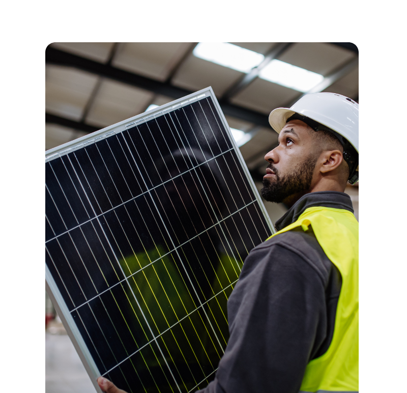 Man With Solar Panel Looking To The Ceiling